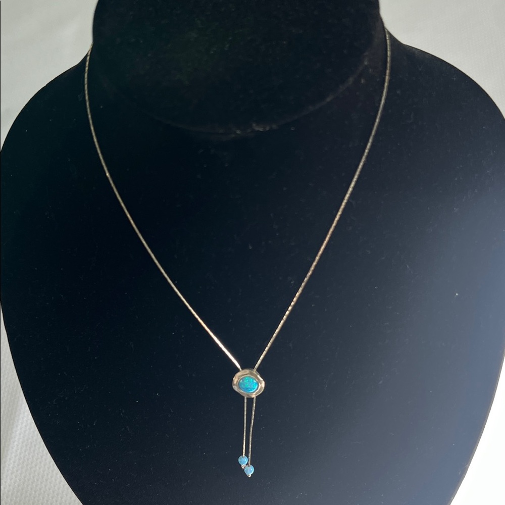 Elegant Blue Pendant Necklace. Hangs 10 inches.
